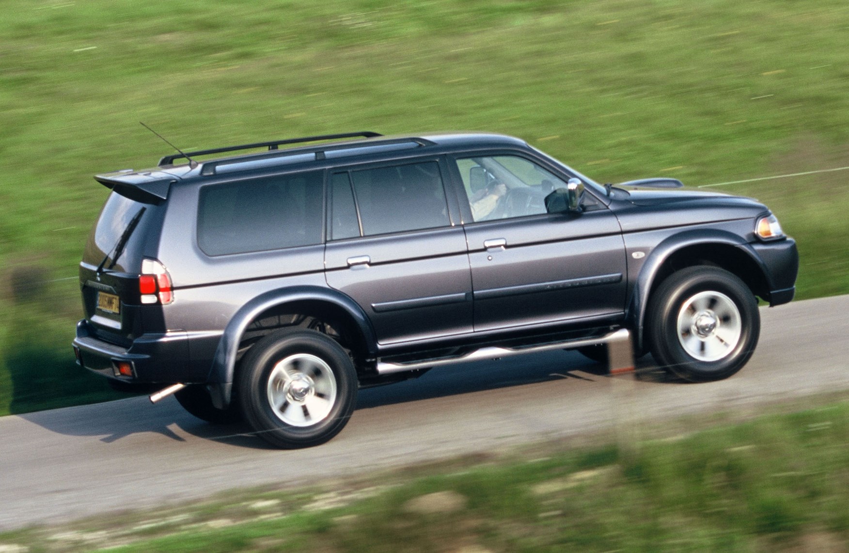 Митсубиси паджеро спорт 1. Mitsubishi Pajero Sport 2006. Mitsubishi Pajero Sport i (1998-2008). Митсубиси Монтеро спорт 2006. Митсубиси Паджеро спорт 1998.