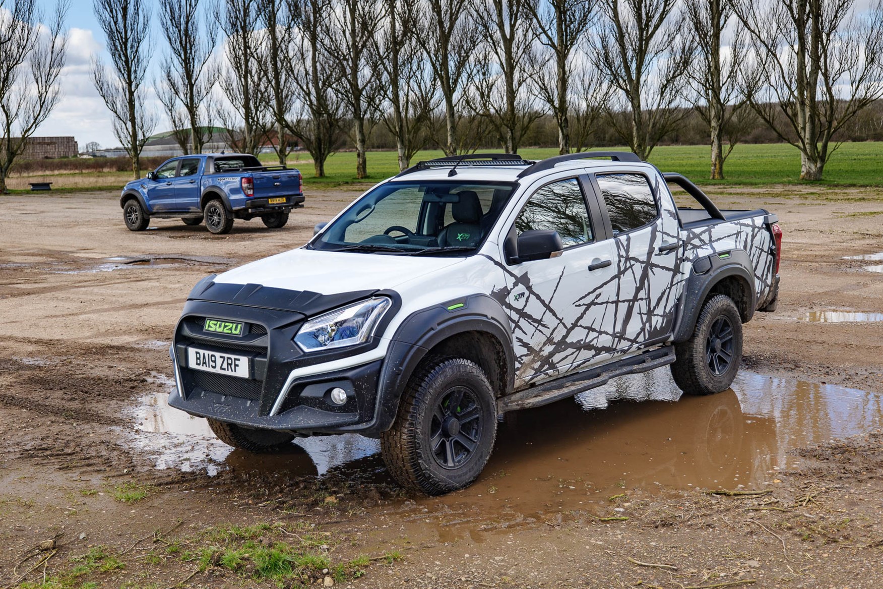 Ford Ranger Raptor Vs Isuzu D Max Xtr Twin Test Review Battle Of The Ultimate Off Road Lifestyle Pickups Parkers