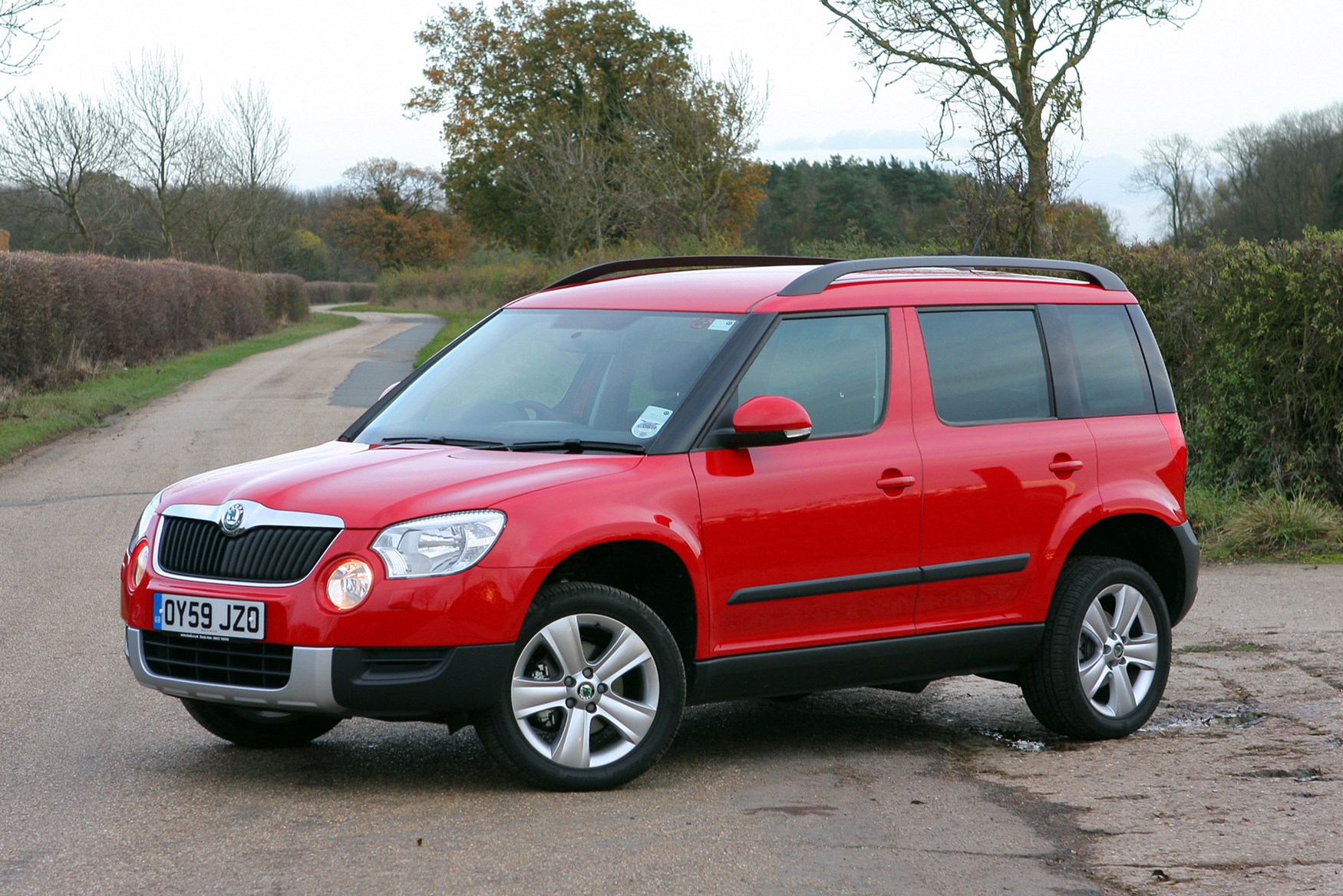 Красный йети. Шкода Йети. Skoda Yeti 2009. Шкода етти красная. Шкода Йети 2005.