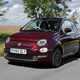 Red Fiat 500 driving front 2015
