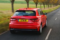 Red 2019 Audi A1 Sport rear driving