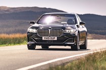 BMW 7 Series review, front view, driving, sunshine
