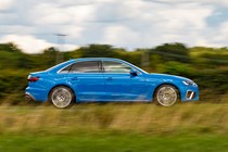 Blue 2019 Audi A4 Saloon side elevation driving