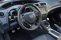 2014 Honda Civic keeps the space-age dashboard with a few glossier trim finishes