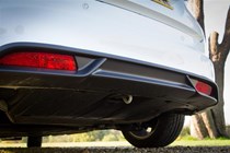 Lower bumper's dark trim on the 2014 Honda Civic reduces its visual bulk