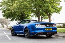 Ford Mustang convertible facelift rear, roof down, blue