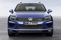 The new grille and bumper are designed to make the Touareg look wider
