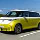 Volkswagen ID. Buzz LWB: front three quarter driving, German plates, yellow and white paint