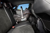 Ford Puma ST (2024) review: child seat on rear seat, black interior