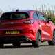 Ford Puma ST (2024) review: cornering rear, red paint