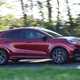 Ford Puma ST (2024) review: side driving, red paint