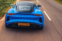 Lotus Emira review, rear view, high, driving on road