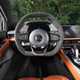 Lotus Emira 2.0-litre (2023): steering wheel and digital gauge cluster, tan upholstery