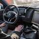 BMW i7 electric car prototype, self-driving interior image, hands-off steering wheel