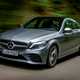 Mercedes-Benz C-Class driving front side, grey
