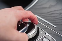 Mercedes infotainment uses a wheel and touchpad control that falls easily to hand