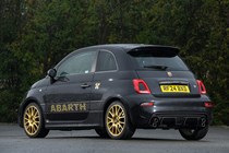 Abarth 695 (2024) review: rear three quarter static, black paint