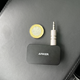 The Anker Soundsync compared to a pound coin