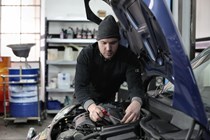Mechanic inspecting engine - What is a service history