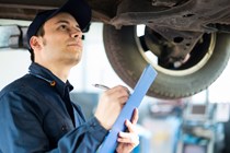 Mechanic with clipboard - What is an MOT