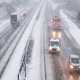 Image of traffic on a snowy dual-carriageway