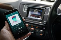 Driver holding phone - What is Bluetooth?