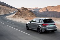 Audi RS3 driving rear, grey
