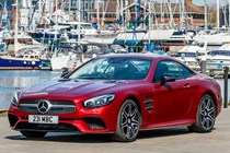 Best hardtop convertible cars 2024: Mercedes SL, front three quarter static, red paint