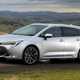 Best estate cars 2024: Toyota Corolla Touring Sports, front three quarter driving, silver paint, British road