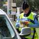 Gendarme writing ticket - Driving in France