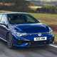 Best cheap fast cars in 2024: Volkswagen Golf R, front three quarter driving, blue paint