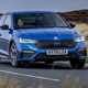 Best cheap fast cars in 2024: Skoda Octavia vRS, front three quarter cornering, blue paint