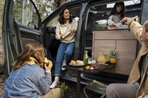 Family picnicking in a Citroen Holidays
