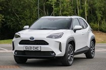 2021 white Toyota Yaris Cross, captured from the front right angle.