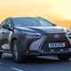 2021 Lexus NX taken on driver side front with orange sunset background