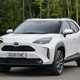 2021 white Toyota Yaris Cross, captured from the front right angle.