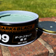 An open tin of Soft99 Black Wax