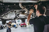 Mechanics inspecting car - How to spot a clocked car