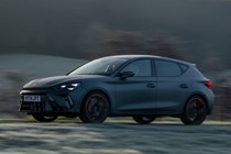 Cupra Leon (2025) review: side view driving, matte grey paint