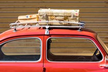 Luggage on an old car
