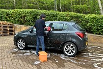 Cleaning a grey car with the Autoglym car shampoo