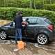 Cleaning a grey car with the Autoglym car shampoo