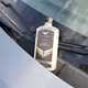 Car Gods shampoo sitting next to windscreen wiper