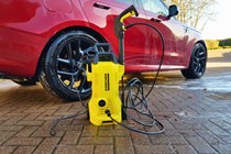 Karcher K2 next to Range Rover Sport
