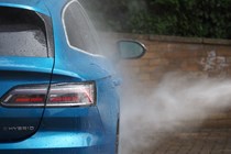 A VW Arteon being pressure washed