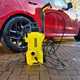 Karcher K2 next to Range Rover Sport