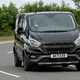 Ford Transit Custom Trail DCIV long-term test review, front view, driving, Shadow Black