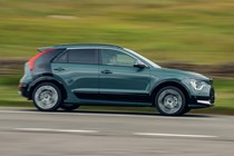 Kia Niro review - side view, grey, driving