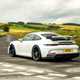 Porsche 911 GT3 review - white, rear, driving round corner