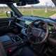 Land Rover Defender 130 V8 review: front seats and dashboard, black upholstery